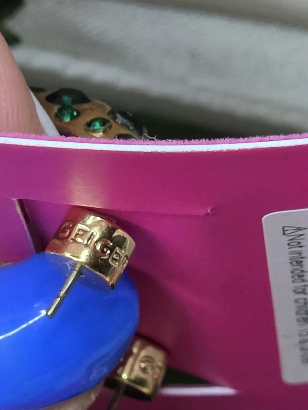Kurt Geiger Gold Huggie Hoop Earrings with Green Stones